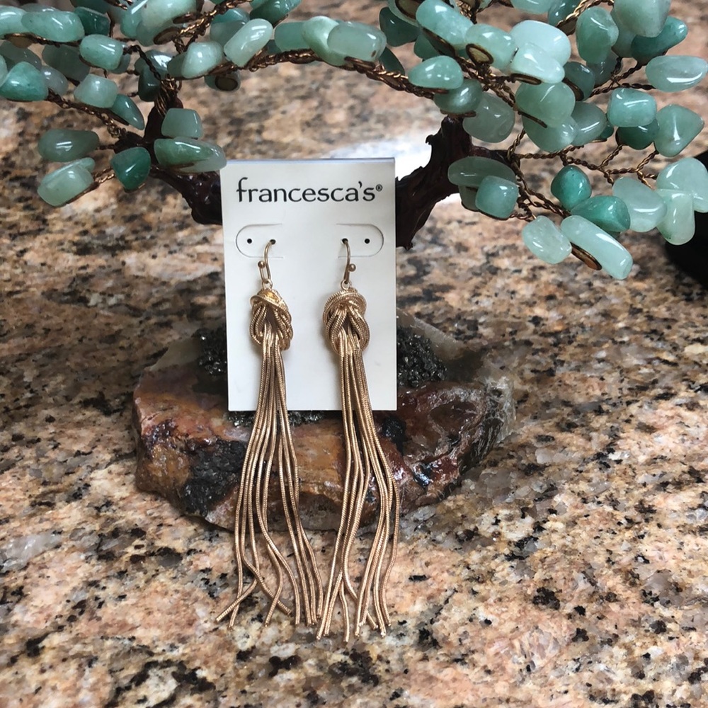 Dangling gold earrings